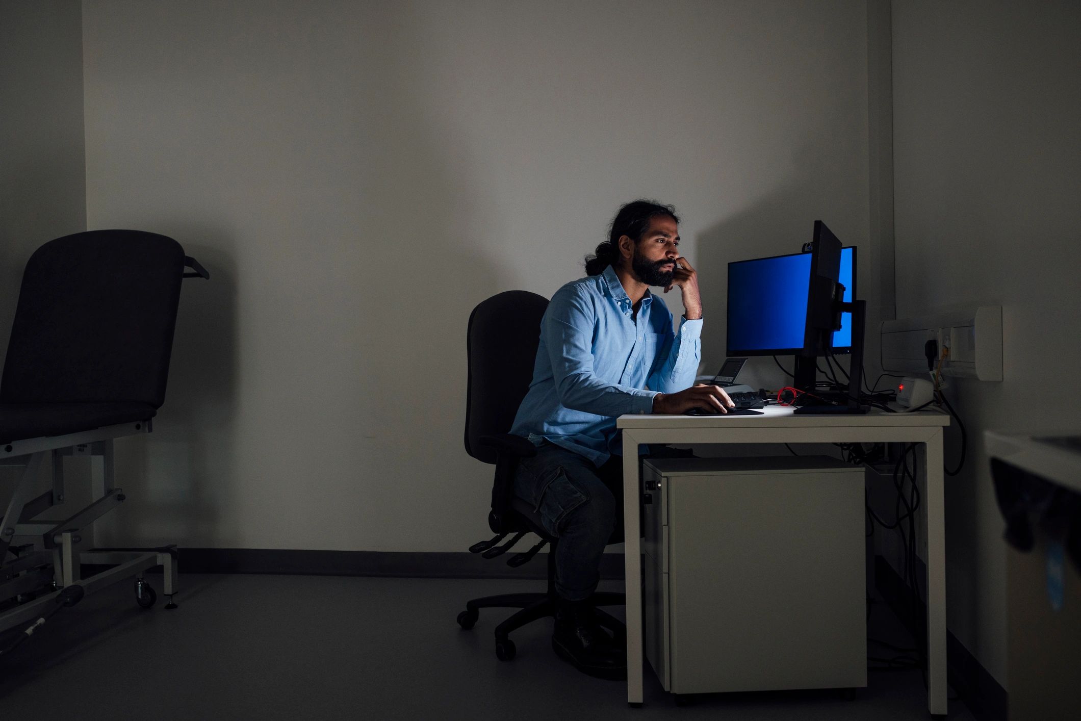 Professional working late at a computer